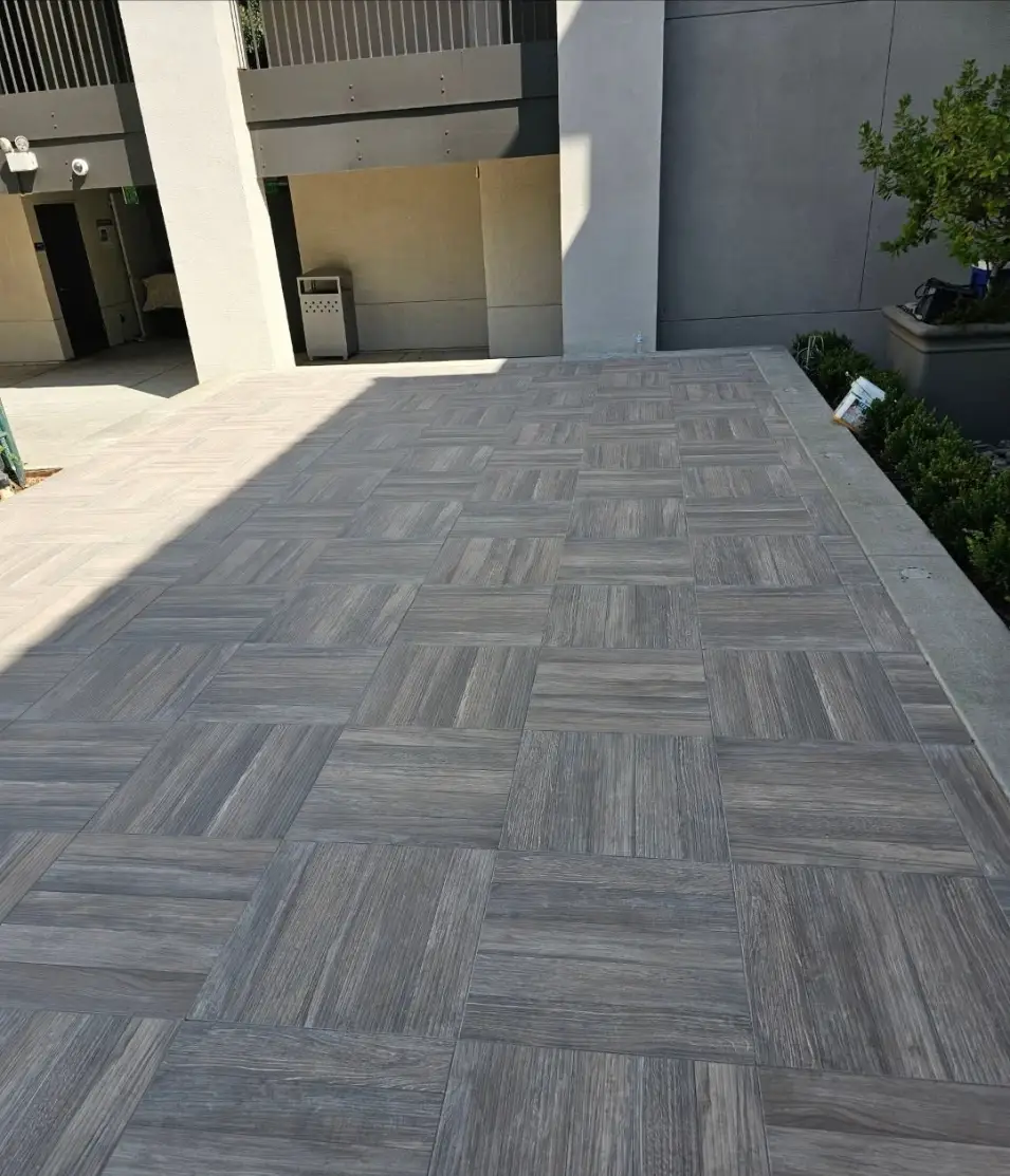 Wood-look paver detail in parquet pattern