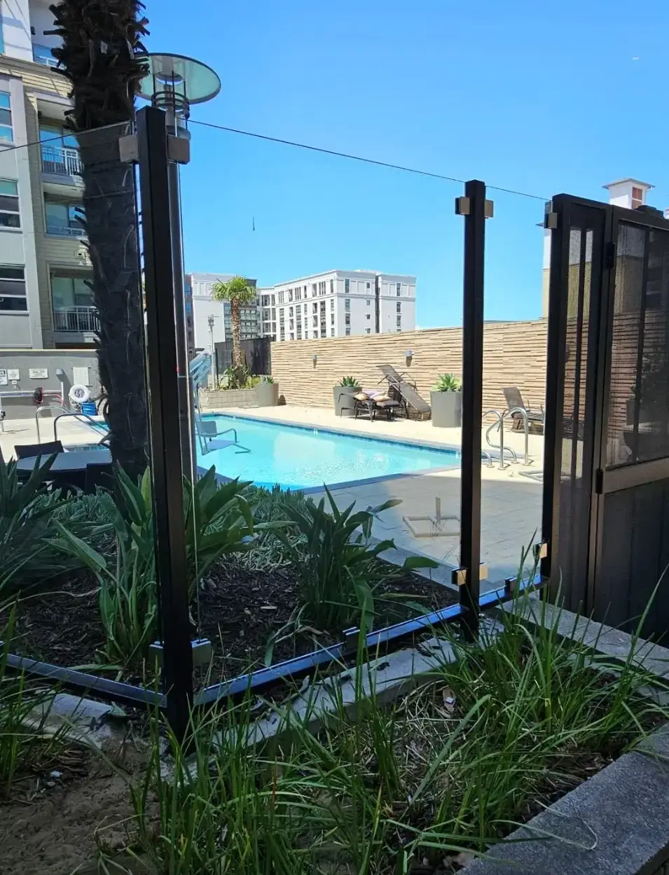 Rooftop pool with glass fence